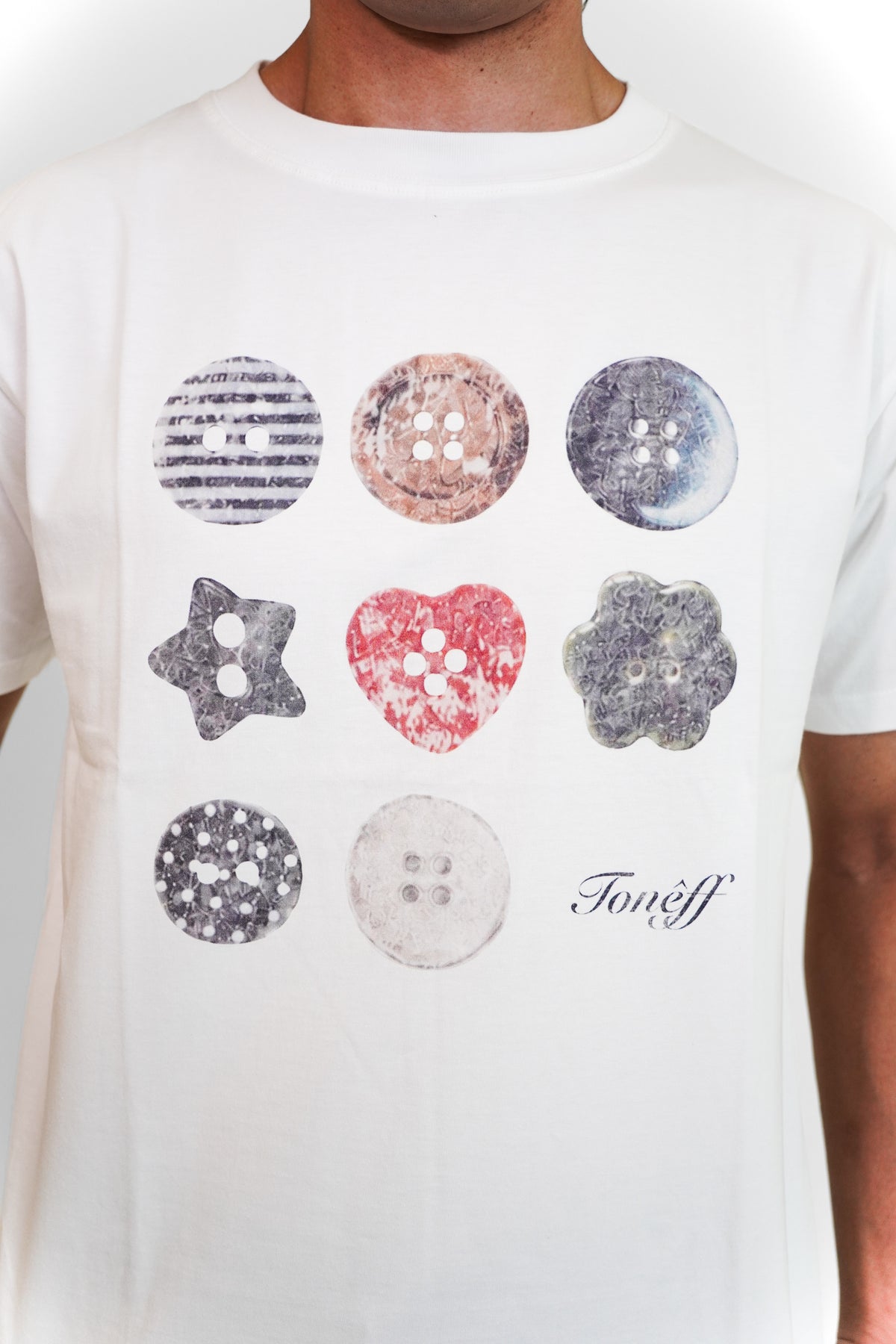 "Buttons" Tee